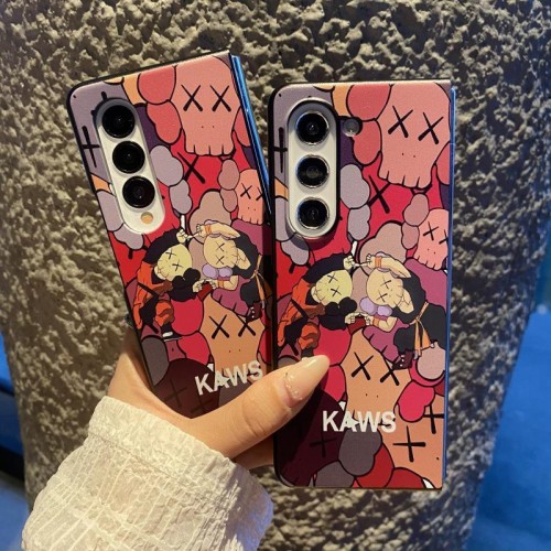 Kaws カウズブランドギャラクシーz flip6 4 5 fold6 5 4 3スマホカバースムーズかわいいsamsung z fold 6 5 4 flip6 5 4ケースカバー激安大人っぽい ギャラクシーz fold3/2 4 5 6ブランドスマホカバーブランド落下保護galaxy z flip3 4 5 6携帯カバーレディース