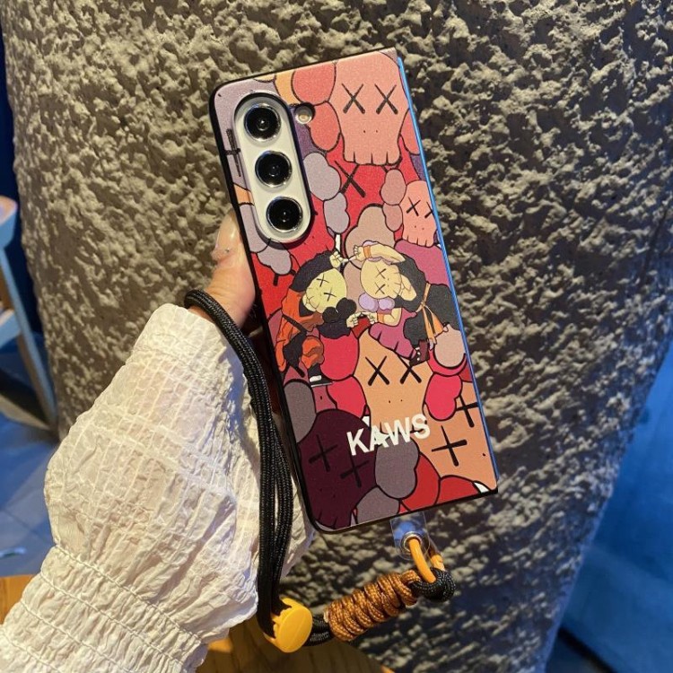 Kaws カウズブランドギャラクシーz flip6 4 5 fold6 5 4 3スマホカバースムーズかわいいsamsung z fold 6 5 4 flip6 5 4ケースカバー激安大人っぽい ギャラクシーz fold3/2 4 5 6ブランドスマホカバーブランド落下保護galaxy z flip3 4 5 6携帯カバーレディース